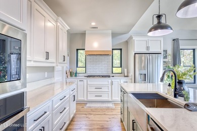 Discover the Height of Refined Living at 4441 Audubon Trail in - photo 2