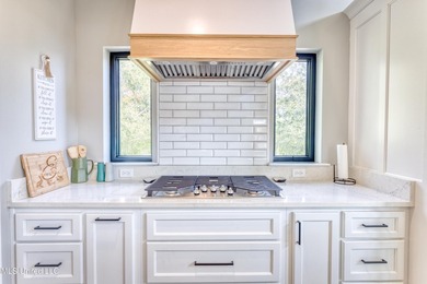 Discover the Height of Refined Living at 4441 Audubon Trail in - photo 3