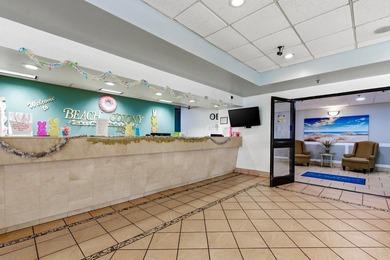 Dive into oceanfront luxury with this stylishly renovated - photo 22