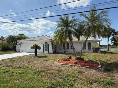 Lake Home For Sale in Lehigh Acres, Florida