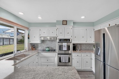 Nestled on an expansive 10,000+ square foot lot, this - photo 7