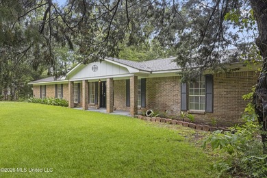 Enjoy waterfront living in this 3-bedroom, 2-bath home located - photo 2