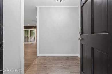 Enjoy waterfront living in this 3-bedroom, 2-bath home located - photo 4