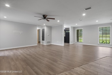 Enjoy waterfront living in this 3-bedroom, 2-bath home located - photo 5