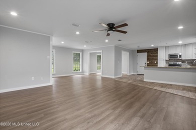 Enjoy waterfront living in this 3-bedroom, 2-bath home located - photo 8