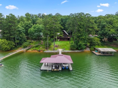 Smith Lake, rustic and beautiful!  This 5 BR/4 BA home is on a - Lake Home For Sale in Logan, Alabama