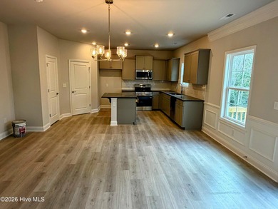 Welcome home to this stunning 4-bedroom, 2.5-bath, 2,131 sq. ft - photo 3
