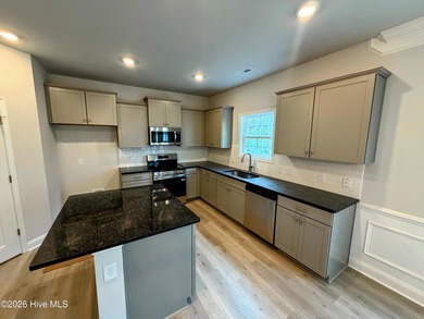 Welcome home to this stunning 4-bedroom, 2.5-bath, 2,131 sq. ft - photo 4