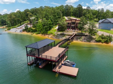 Welcome to this Smith Lake industrial farmhouse!On MLVL, open - Lake Home For Sale in Arley, Alabama