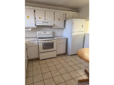 This unit has 2 bedrooms and 11/2 baths. Fully equipped with - photo 2