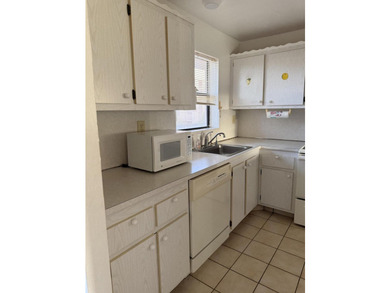 This unit has 2 bedrooms and 11/2 baths. Fully equipped with - photo 3