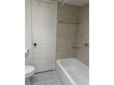 This unit has 2 bedrooms and 11/2 baths. Fully equipped with - photo 7