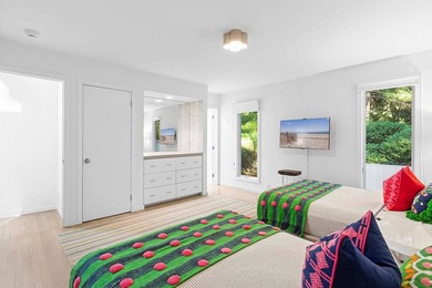 On a quiet lane, this newly renovated home blends modern design - photo 11