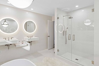 On a quiet lane, this newly renovated home blends modern design - photo 15
