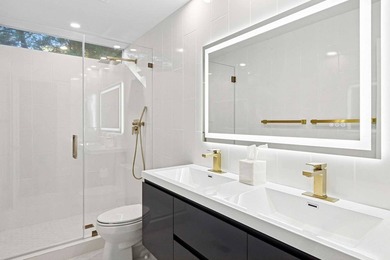 On a quiet lane, this newly renovated home blends modern design - photo 19