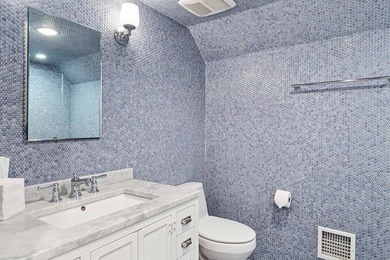 On a quiet lane, this newly renovated home blends modern design - photo 21