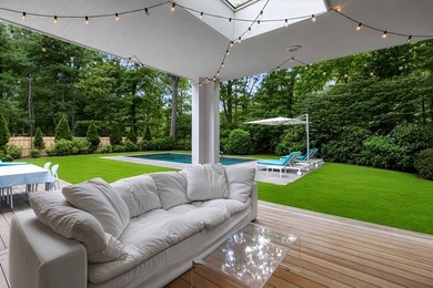 On a quiet lane, this newly renovated home blends modern design - photo 25