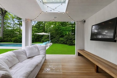 On a quiet lane, this newly renovated home blends modern design - photo 27