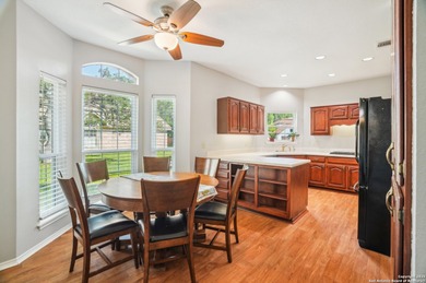 Set on nearly a quarter-acre in a highly sought-after, guarded