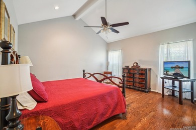 Set on nearly a quarter-acre in a highly sought-after, guarded