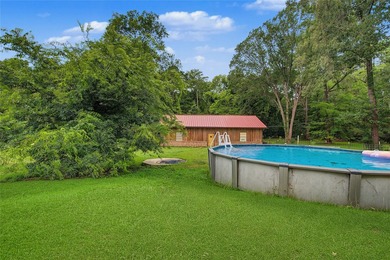 Tucked away on 1.21 acres along the canal side of beautiful Lake - photo 33