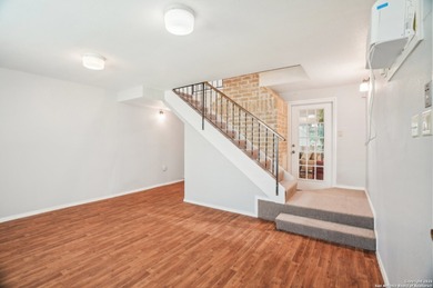 Set on nearly a quarter-acre in a highly sought-after, guarded