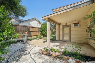 Set on nearly a quarter-acre in a highly sought-after, guarded