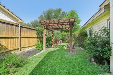 Set on nearly a quarter-acre in a highly sought-after, guarded