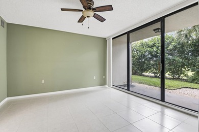 This inviting first-floor, two-bedroom, two-bath condo offers a - photo 13