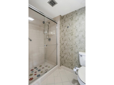 This inviting first-floor, two-bedroom, two-bath condo offers a - photo 14