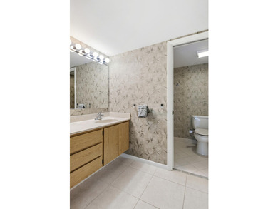 This inviting first-floor, two-bedroom, two-bath condo offers a - photo 15