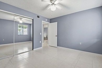 This inviting first-floor, two-bedroom, two-bath condo offers a - photo 20