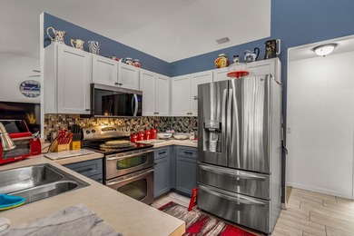 For sale for the first time, this custom built, lake front, pool - photo 22