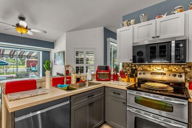 For sale for the first time, this custom built, lake front, pool - photo 23
