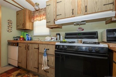 1.6 acres near Arbuckle Lake! This 3 bed, 2 bath mobile home - photo 13