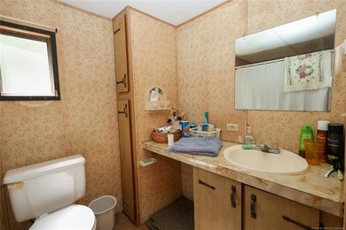 1.6 acres near Arbuckle Lake! This 3 bed, 2 bath mobile home - photo 19