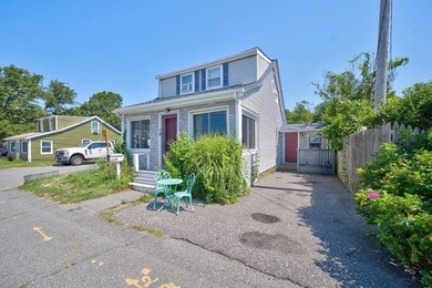 Enjoy coastal living in this charming 3-bedroom, 2-bath Cape in - photo 2