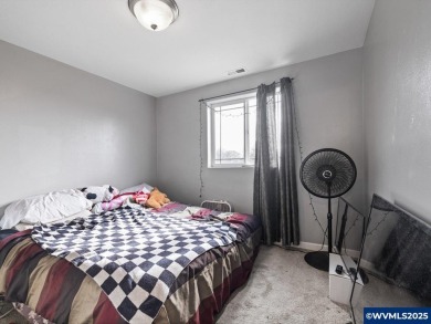 Charming 4-bedroom, 3-bath, two-story home set back from the