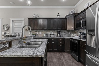 A beautifully situated all brick home on a level corner lot - photo 14