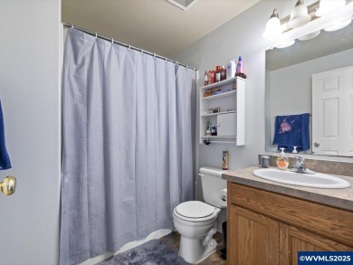 Charming 4-bedroom, 3-bath, two-story home set back from the