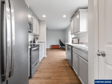 Charming 4-bedroom, 3-bath, two-story home set back from the