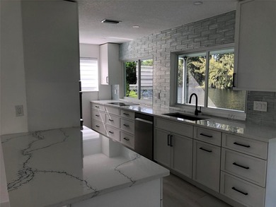 Fully Renovated 2/2 Single Family Waterfront Home w/ Many - photo 10