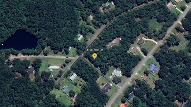 Priced aggressively at $16,000, this vacant corner lot in the - photo 4