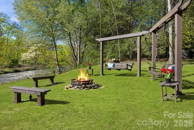 RIVERFRONT home on 2.4 acres in Linville Falls, where the sound - photo 43