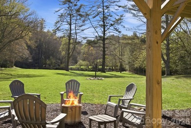 RIVERFRONT home on 2.4 acres in Linville Falls, where the sound - photo 45