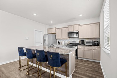Located in a welcoming, kid-friendly community within the highly - photo 13