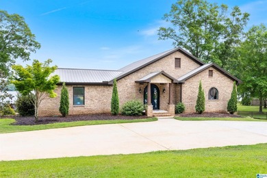 This all-brick, four-bedroom, four-and-a-half-bath home blends - photo 2