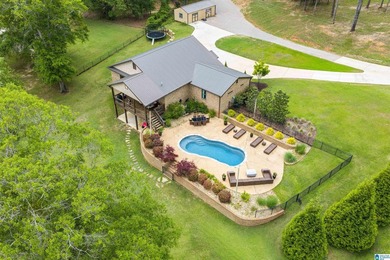 This all-brick, four-bedroom, four-and-a-half-bath home blends - photo 3