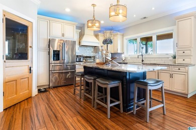 This all-brick, four-bedroom, four-and-a-half-bath home blends - photo 8