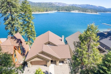 Experience sophisticated lakefront living in this striking - photo 1